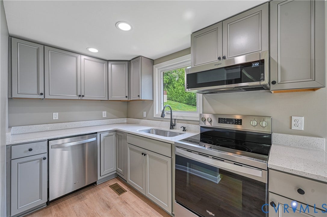 309 Ellis Drive, Louisa, VA 23093 Kitchen featuring stainless steel appliances, light gray shaker cabinetry, recessed lighting, wood-finish flooring, and light-toned countertops