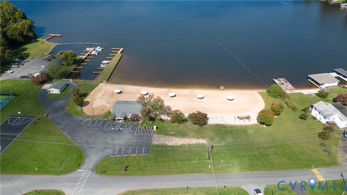 309 Ellis Drive, Louisa, VA 23093 Private sandy beach with several shade structures