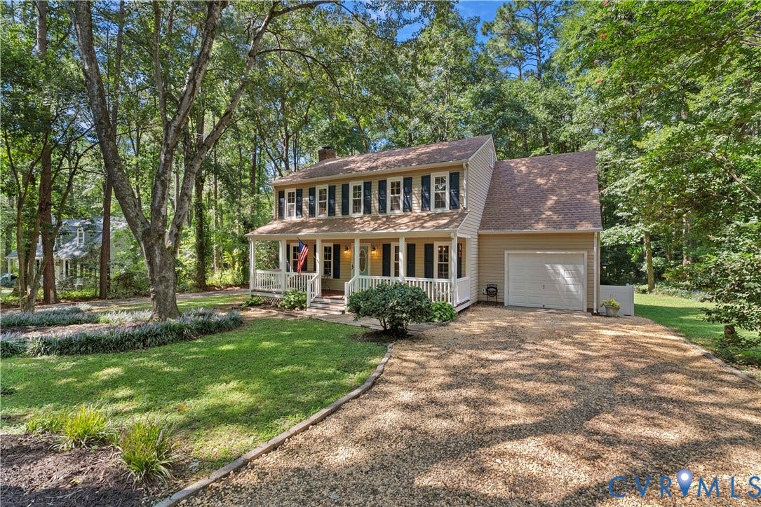 13908 Sterlings Bridge Road, Midlothian, VA 23112 Two-story home with a covered front porch, attached garage, and gravel driveway