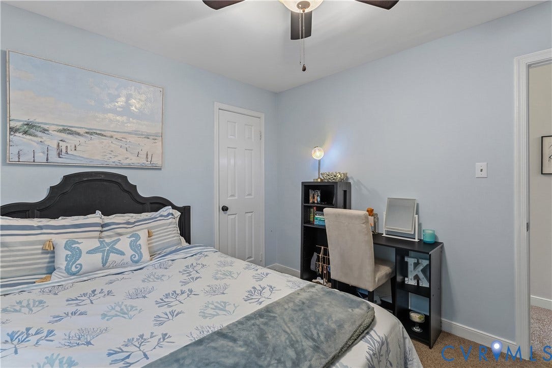 13908 Sterlings Bridge Road, Midlothian, VA 23112 Light blue painted walls and a dark wood-finish ceiling fan