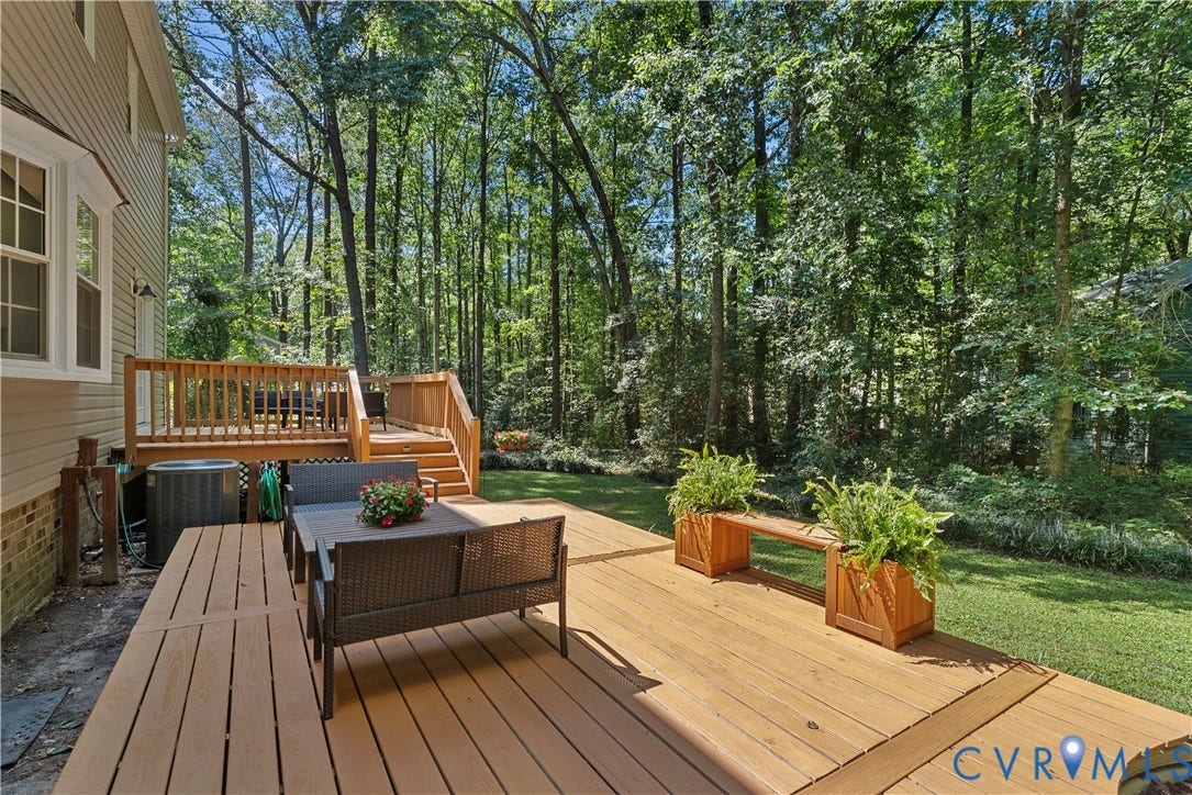 13908 Sterlings Bridge Road, Midlothian, VA 23112 Multi-level wood deck with stairs, surrounded by mature trees
