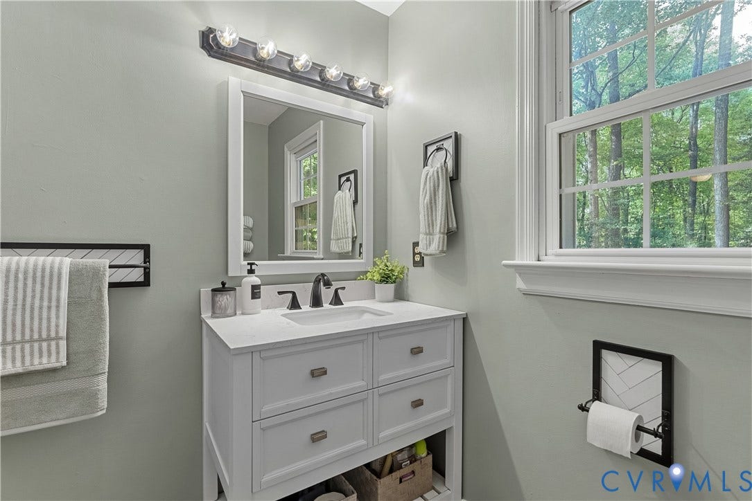 13908 Sterlings Bridge Road, Midlothian, VA 23112 Single-sink vanity with white cabinetry and integrated sink