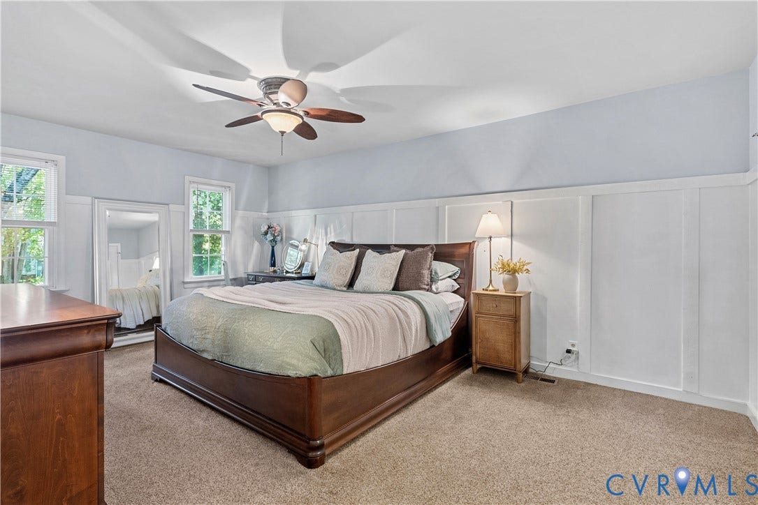 13908 Sterlings Bridge Road, Midlothian, VA 23112 Board and batten wall detailing, ceiling fan with light fixture, carpeted flooring, two windows with trim, and a full-length mirror