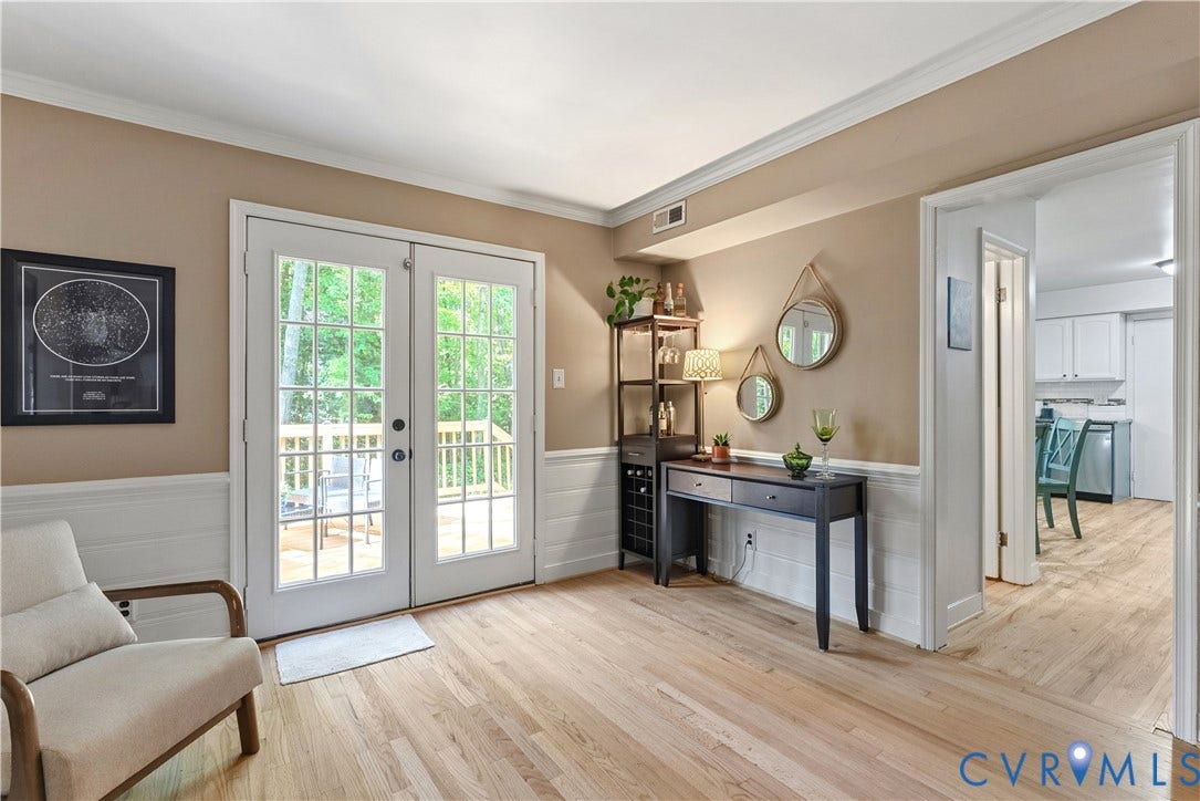 13908 Sterlings Bridge Road, Midlothian, VA 23112 Hardwood-style flooring throughout, white wainscoting, and a neutral wall color
