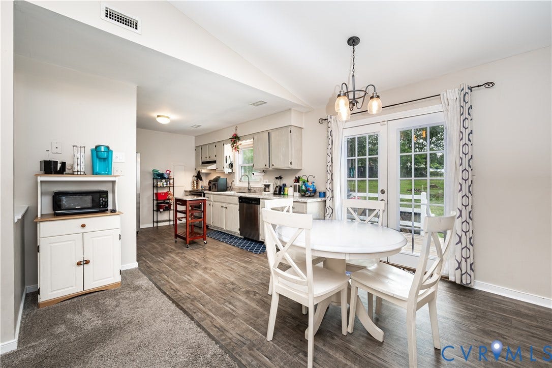 19105 Braebrook Drive, Chesterfield, VA 23834 Open-concept kitchen and dining area featuring wood-finish flooring
