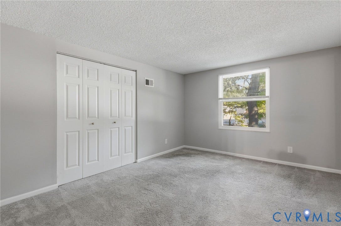 2460 Stembridge Court, #G, Richmond, VA 23238 Light gray wall paint with white trim, new gray carpet flooring, and a white framed window