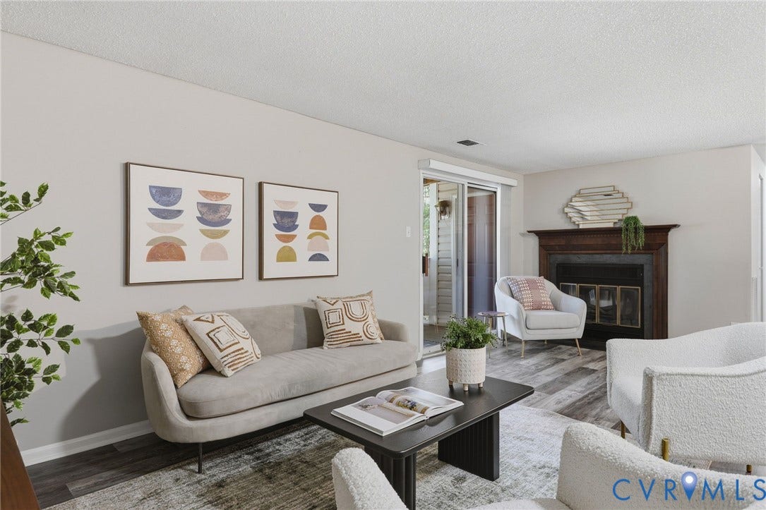 2460 Stembridge Court, #G, Richmond, VA 23238 Living area featuring, a fireplace with a dark wood mantel, and sliding glass doors