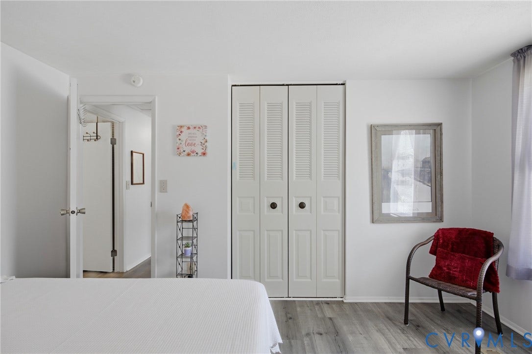 2007 Mountain Pine Boulevard, Three Pines, Richmond, VA 23235 Light-toned wood-finish flooring, white walls, louvered bi-fold closet doors, and recessed lighting