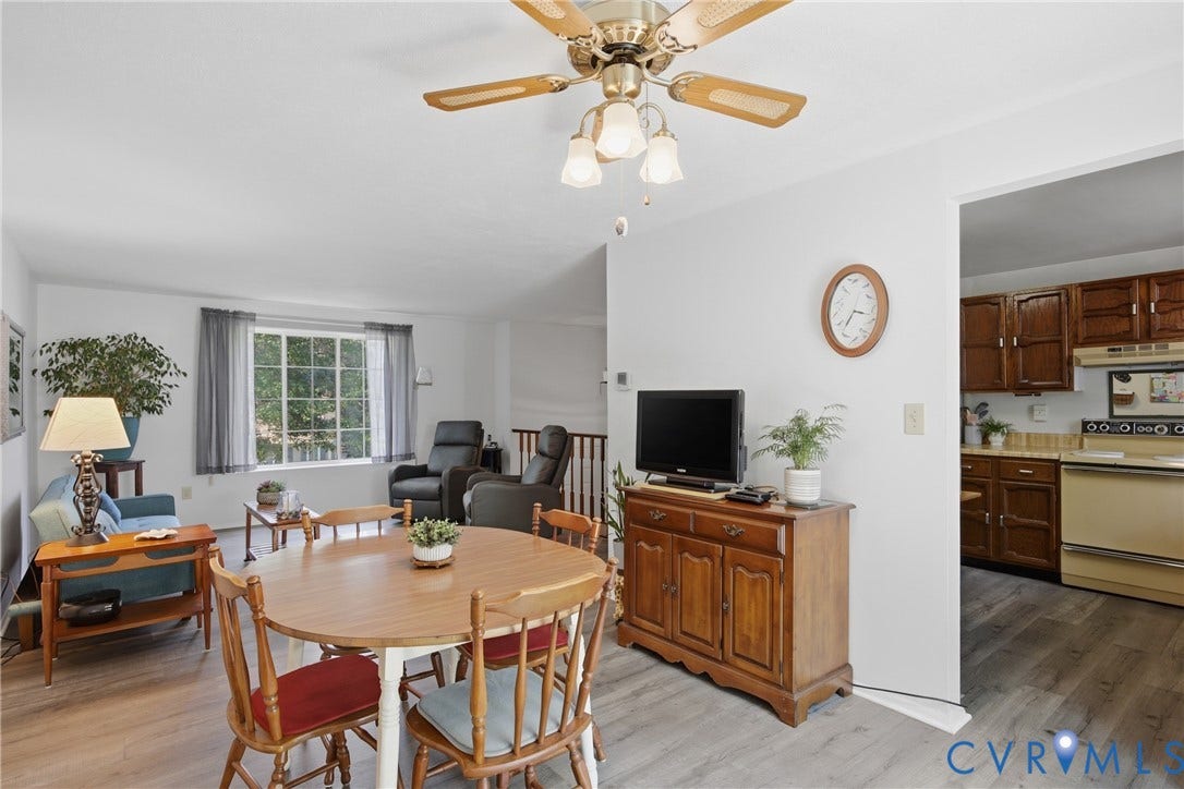 2007 Mountain Pine Boulevard, Three Pines, Richmond, VA 23235 Open-concept living area featuring wood-finish flooring and a ceiling fan