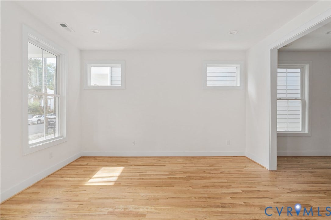 1103 Carlisle Avenue, Montrose Heights, Richmond, VA 23231 Light wood-finish flooring complements crisp white walls