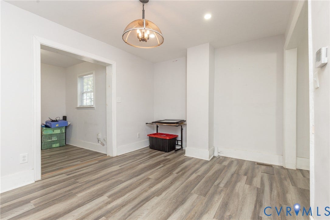 716 E Gladstone Avenue, Richmond, VA 23222 Wood-finish flooring throughout, with a decorative ceiling light fixture and recessed lighting