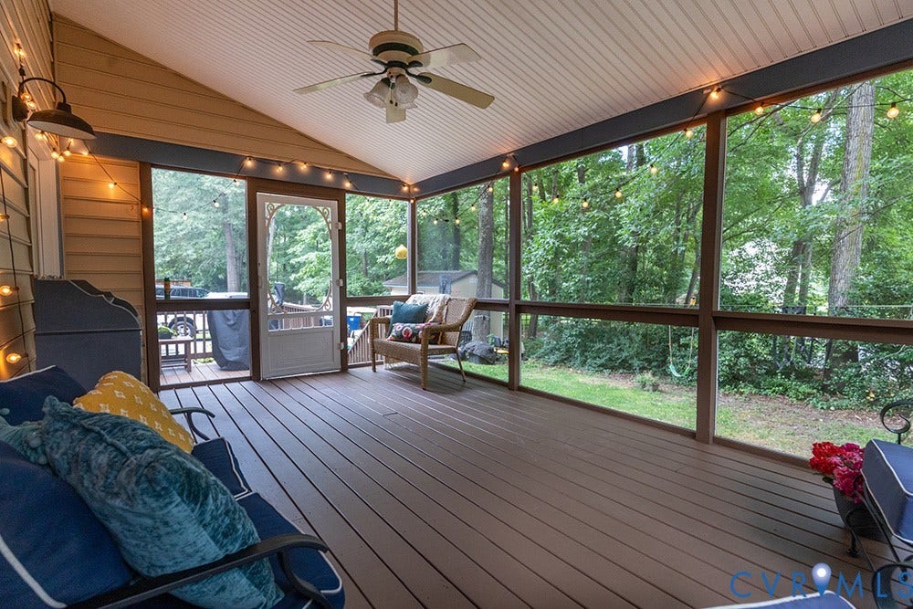 419 Rossmere Drive, Walton Park, Midlothian, VA 23114 Spacious screened porch featuring composite wood-finish flooring, a vaulted ceiling with a ceiling fan, and string lighting