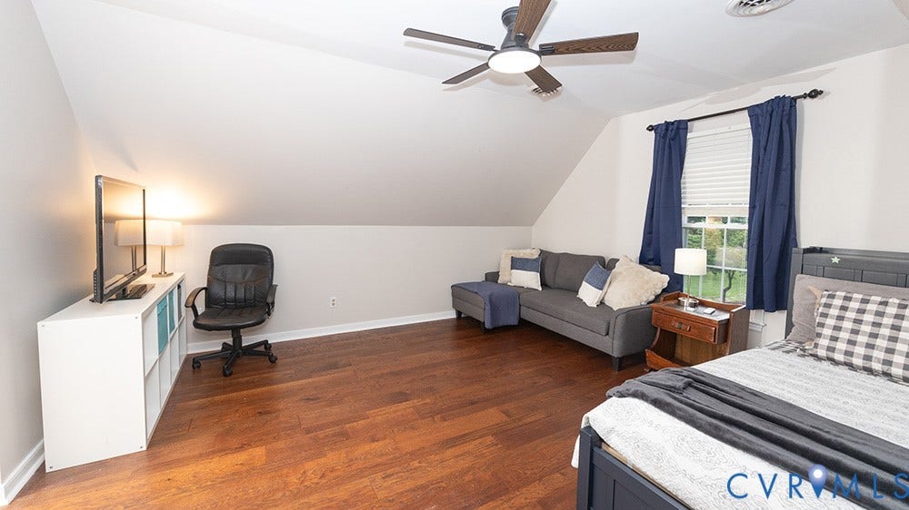 419 Rossmere Drive, Walton Park, Midlothian, VA 23114 Wood-finish flooring throughout, complemented by a ceiling fan with integrated lighting