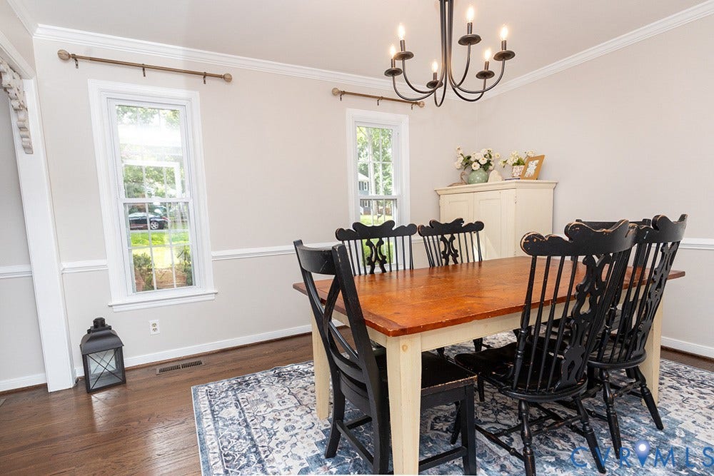 419 Rossmere Drive, Walton Park, Midlothian, VA 23114 Dining area featuring wood-finish flooring, crown molding, chair rail, and a multi-light chandelier