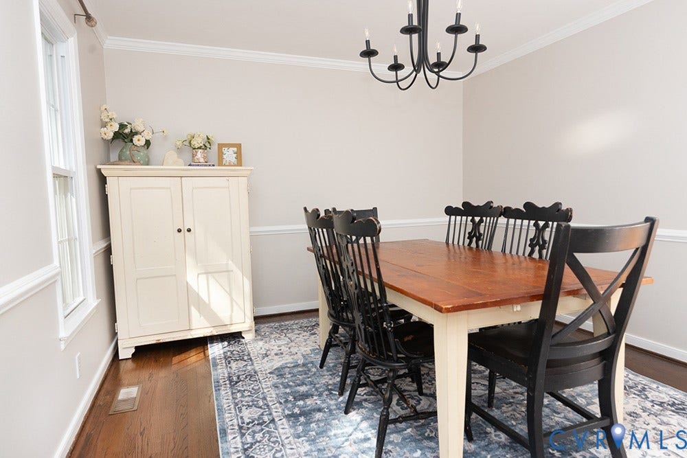 419 Rossmere Drive, Walton Park, Midlothian, VA 23114 Dining area featuring crown molding, chair rail, and dark wood-finish flooring