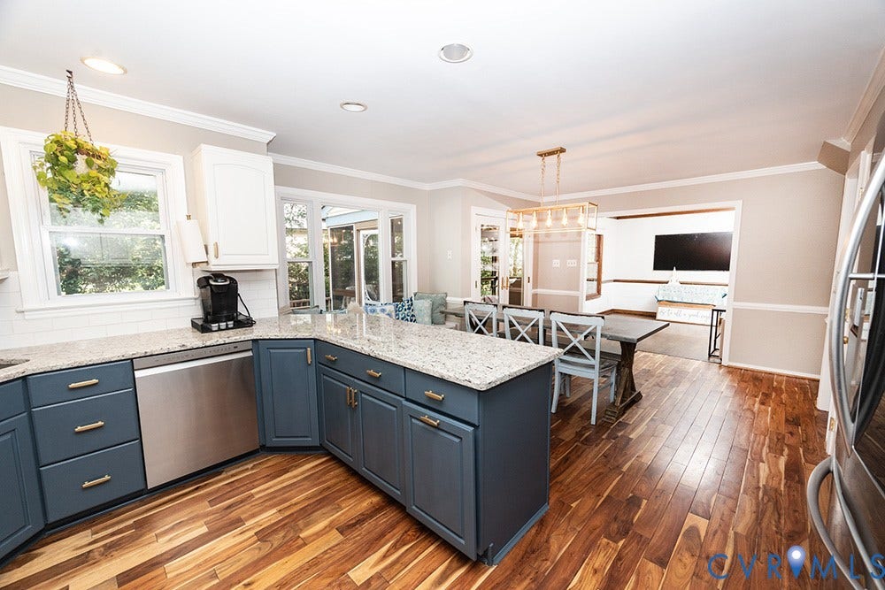 419 Rossmere Drive, Walton Park, Midlothian, VA 23114 Open-concept kitchen featuring wood-finish flooring, white subway tile backsplash, stainless steel appliances, and granite countertops