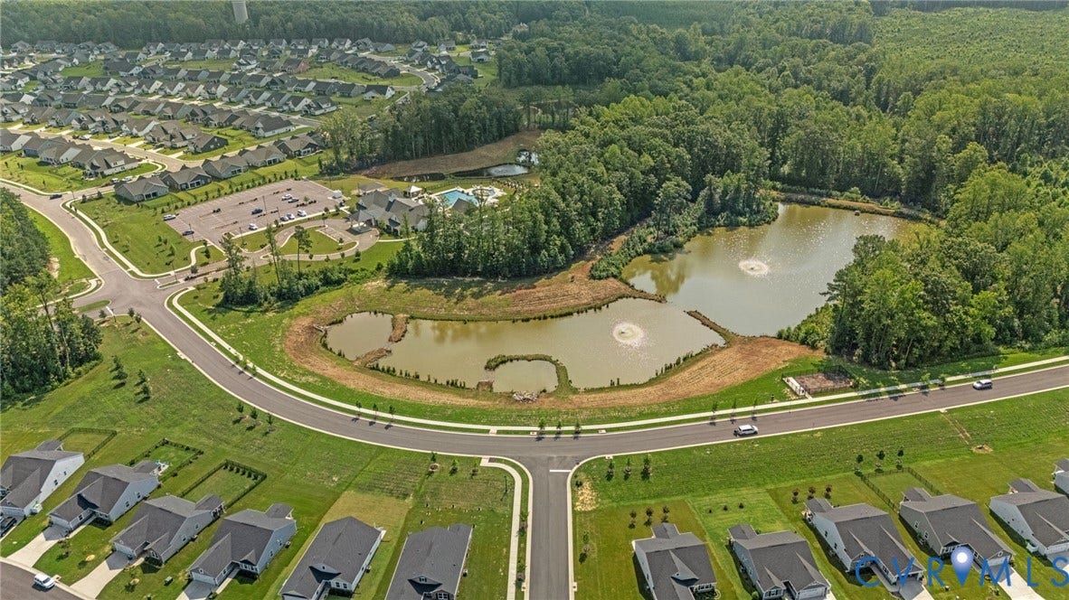 7484 Southamptonshire Way, Autumn Pines, New Kent, VA 23124 Aerial perspective showcasing a residential community with abundant green space