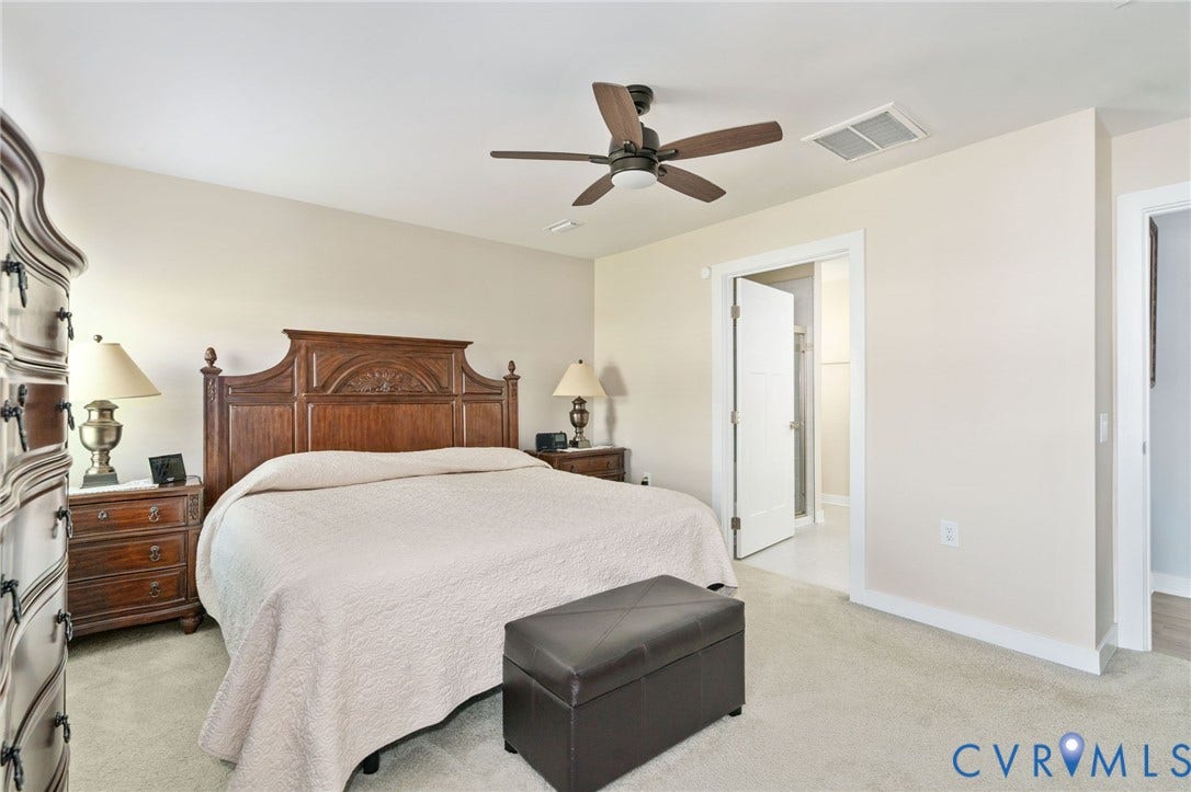 7484 Southamptonshire Way, Autumn Pines, New Kent, VA 23124 Carpeted bedroom featuring a ceiling fan, recessed lighting, and a doorway leading to an additional space