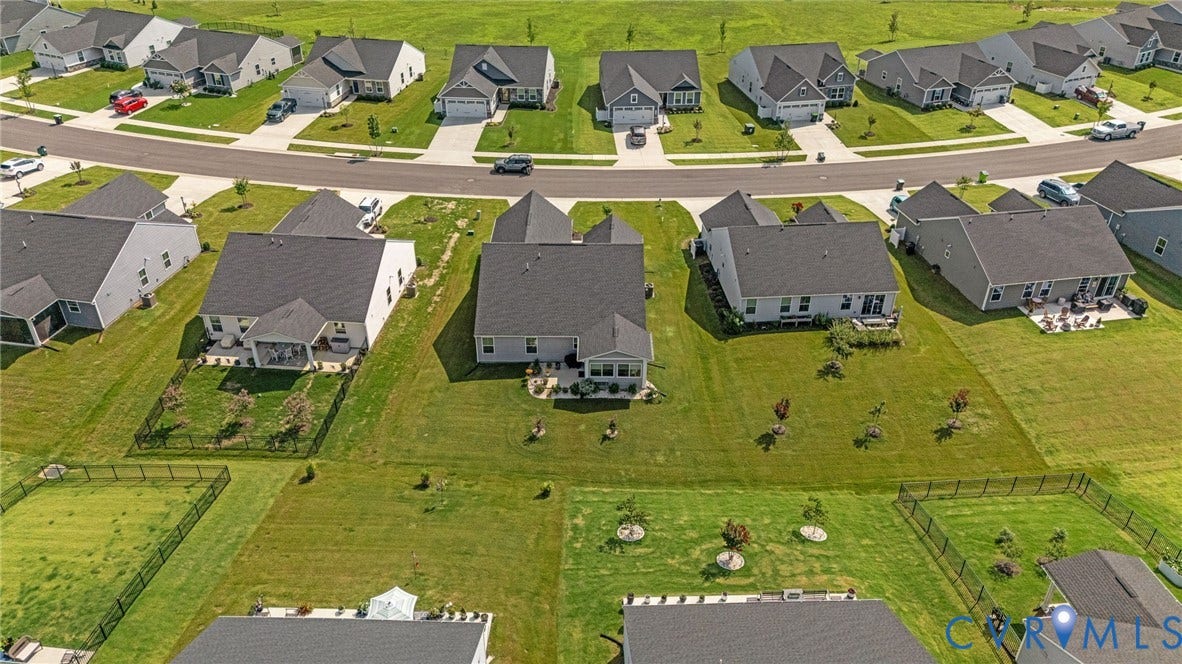 7484 Southamptonshire Way, Autumn Pines, New Kent, VA 23124 Aerial perspective showcasing a residential street with uniform detached homes
