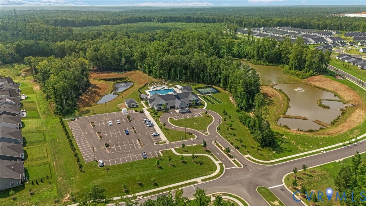 7484 Southamptonshire Way, Autumn Pines, New Kent, VA 23124 Community clubhouse with swimming pool, tennis courts, and ample parking