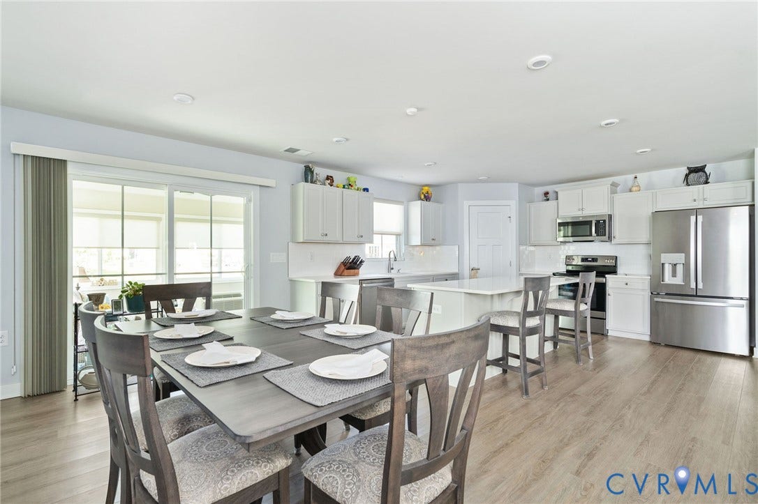 7484 Southamptonshire Way, Autumn Pines, New Kent, VA 23124 Open-concept dining area featuring wood-finish flooring