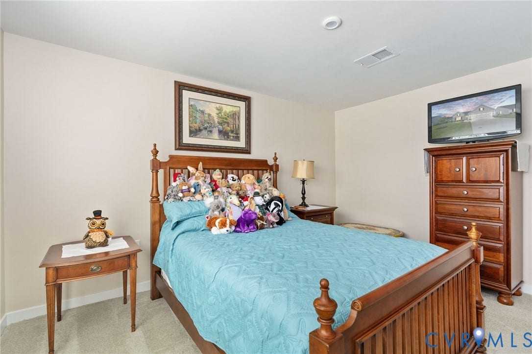 7484 Southamptonshire Way, Autumn Pines, New Kent, VA 23124 Well-proportioned bedroom featuring neutral wall tones, recessed lighting, and carpeted flooring