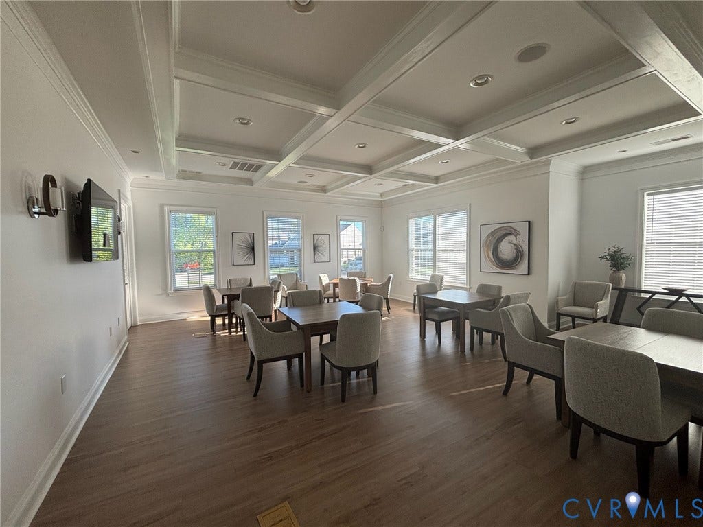 7484 Southamptonshire Way, Autumn Pines, New Kent, VA 23124 Spacious room featuring coffered ceilings, recessed lighting, and wood-finish flooring