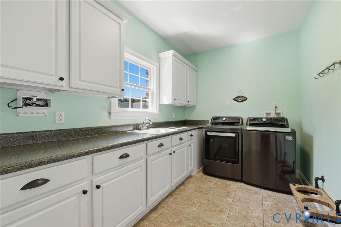 16225 Parrish Farms Road, Montpelier, VA 23192 Laundry room featuring white cabinetry, dark countertops, a window, and tile flooring