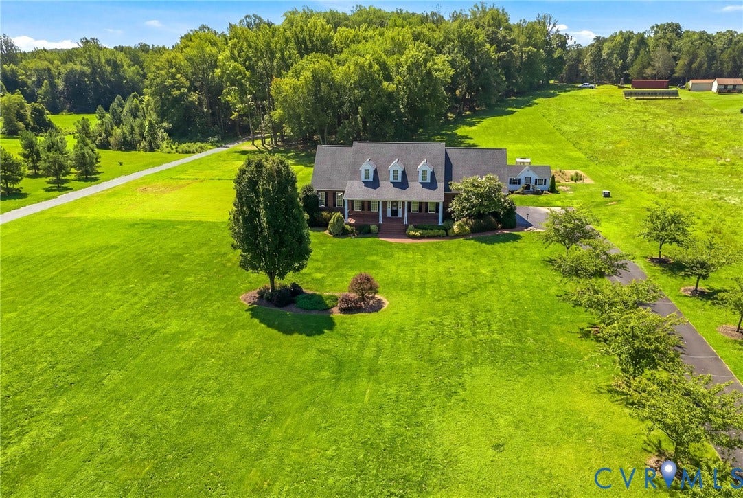 16225 Parrish Farms Road, Montpelier, VA 23192 Expansive green lawn surrounding a traditional-style residence with a dark roof and multiple dormer windows
