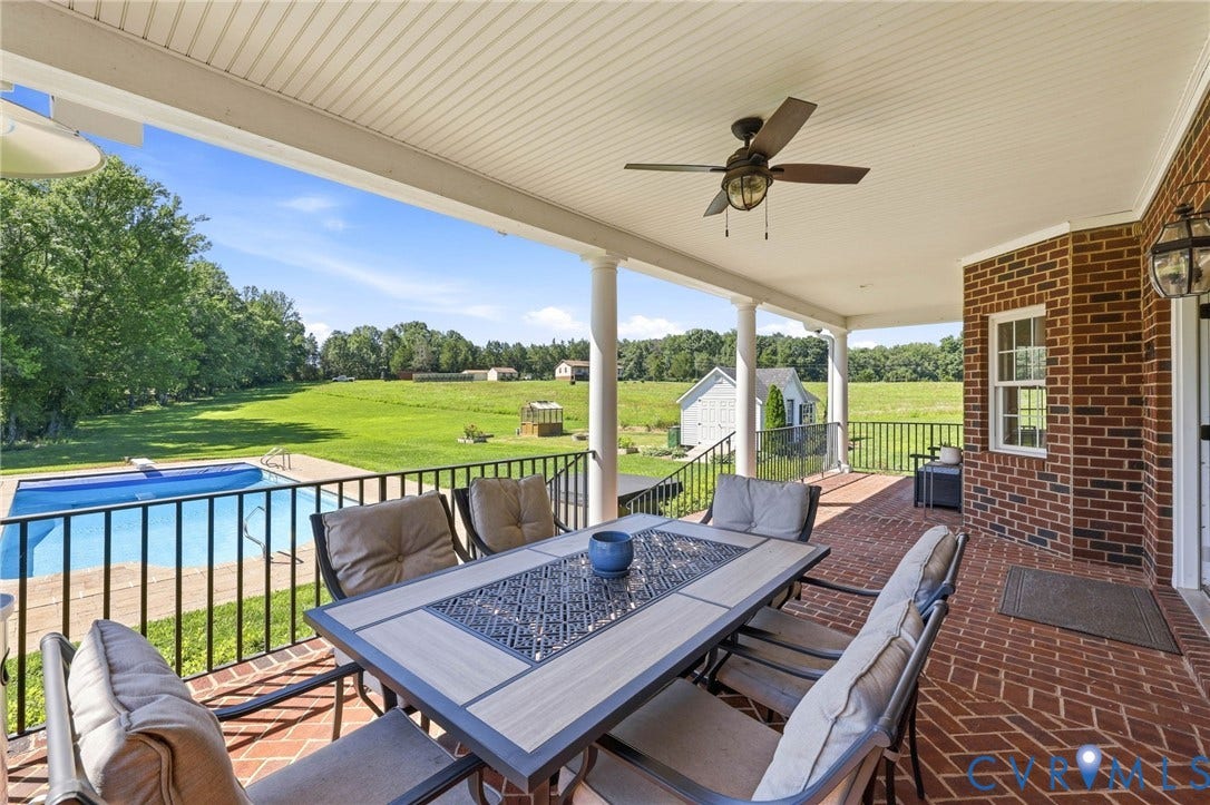 16225 Parrish Farms Road, Montpelier, VA 23192 Expansive covered porch featuring a red brick flooring pattern