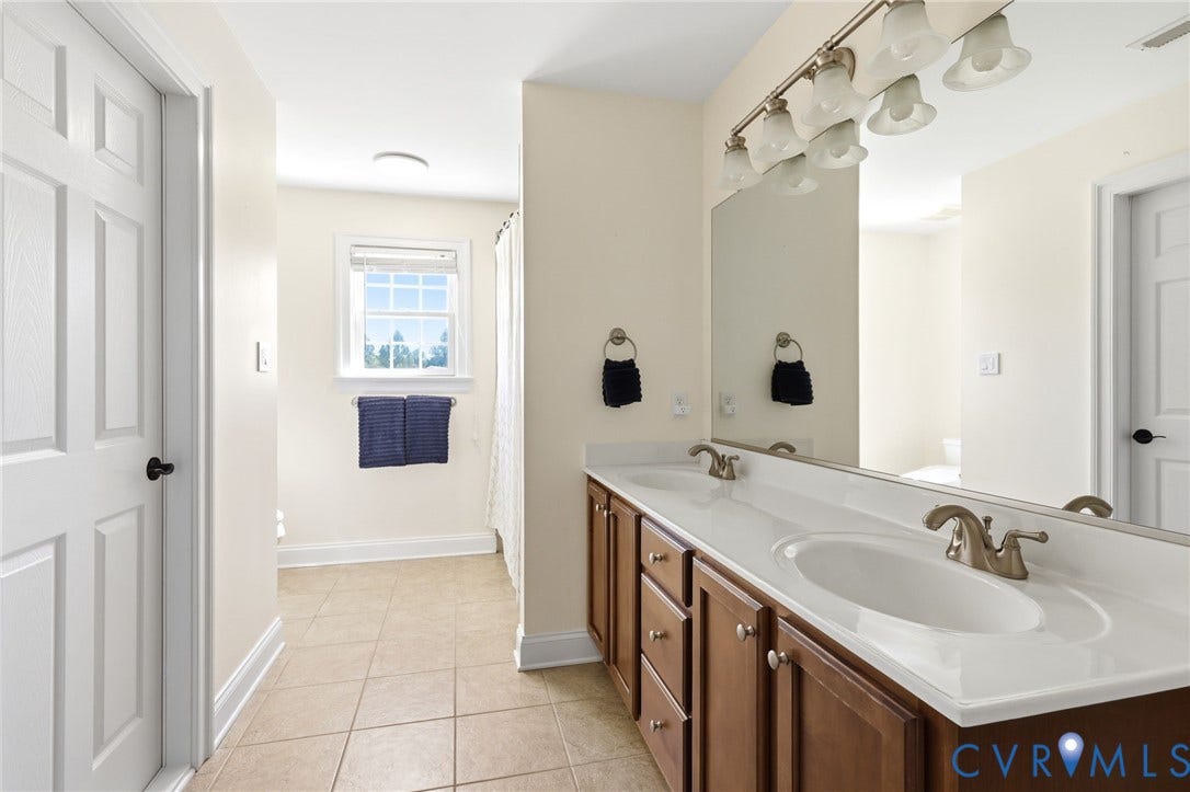16225 Parrish Farms Road, Montpelier, VA 23192 Dual vanity with undermount sinks and brushed nickel faucets