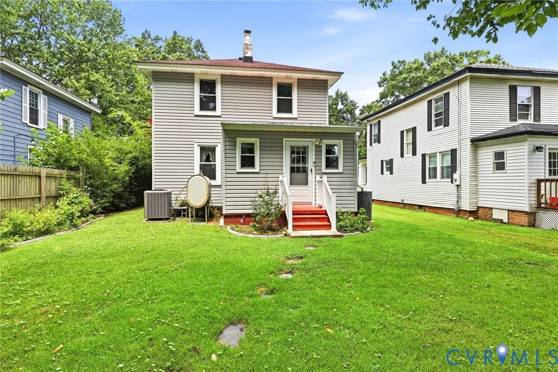 Expansive green lawn providing abundant outdoor space