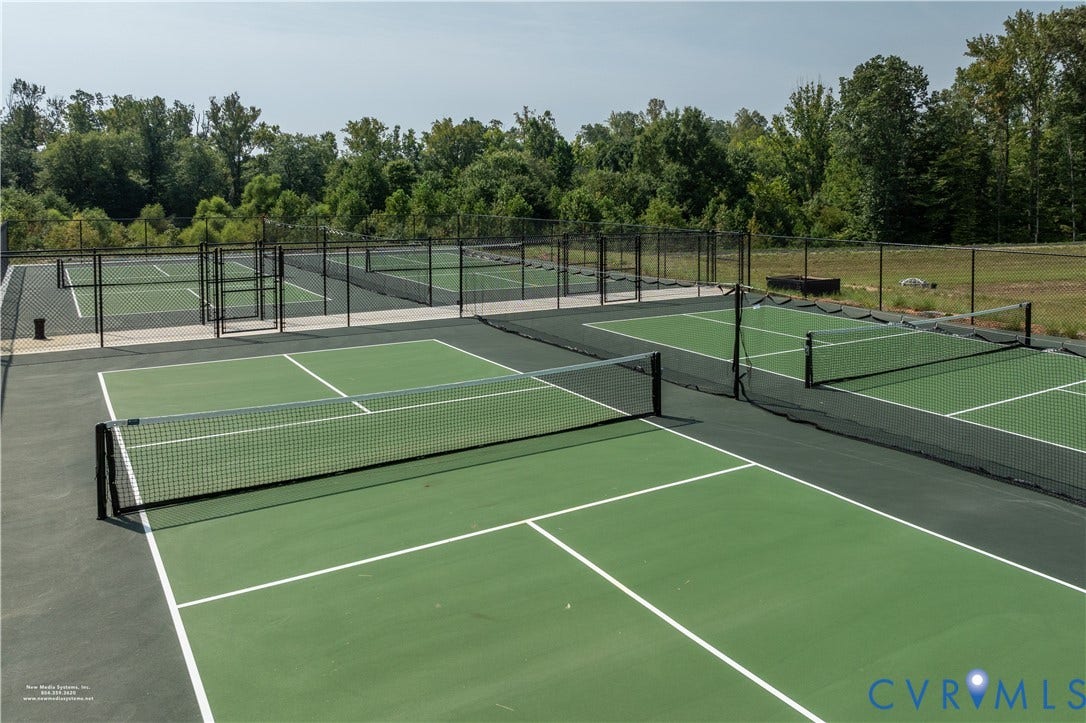12509 N Readers Lane, Readers Branch, Manakin Sabot, VA 23103 Readers Branch community features a clubhouse, pickleball court, and walking trails.