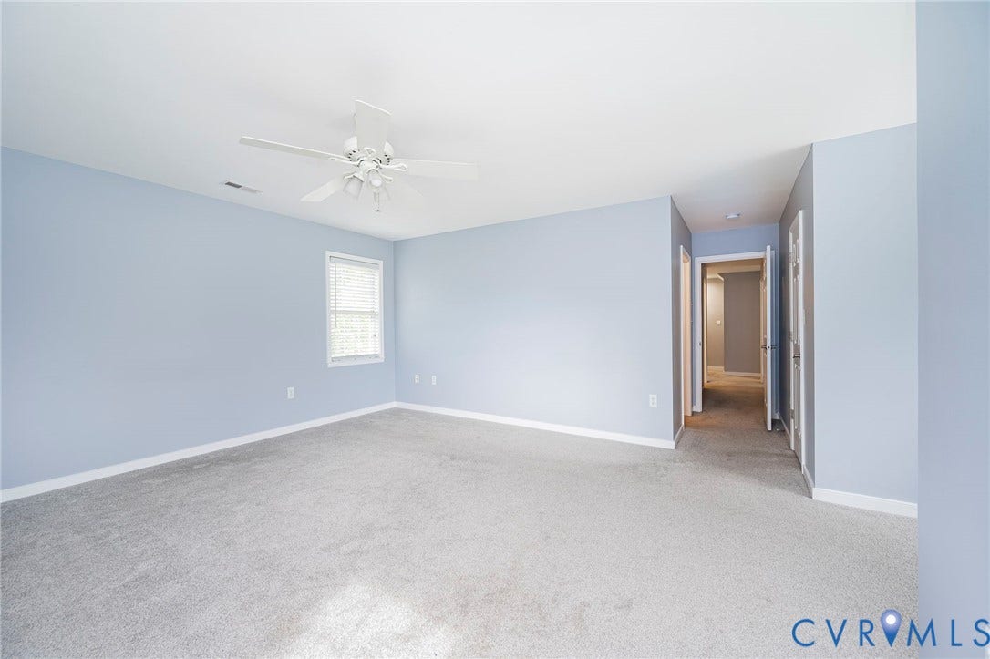 11821 Park Forest Way, Glen Allen, VA 23059 Spacious room featuring light blue walls and neutral carpeting