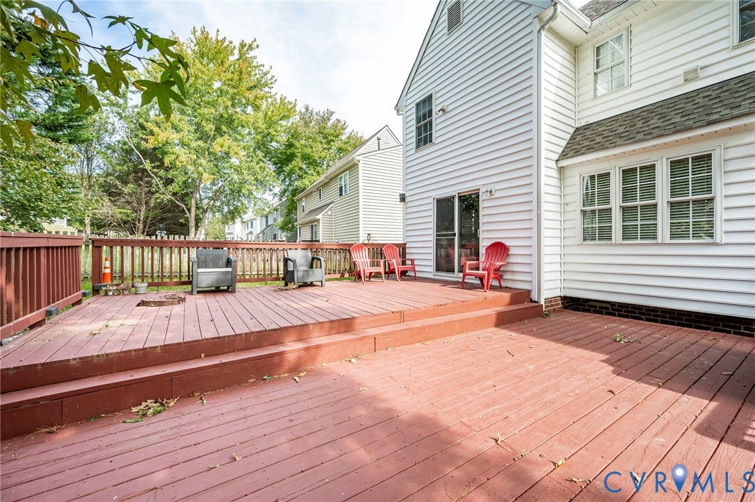 11821 Park Forest Way, Glen Allen, VA 23059 Multi-level wood deck featuring a protective railing and direct access to the interior via a sliding glass door