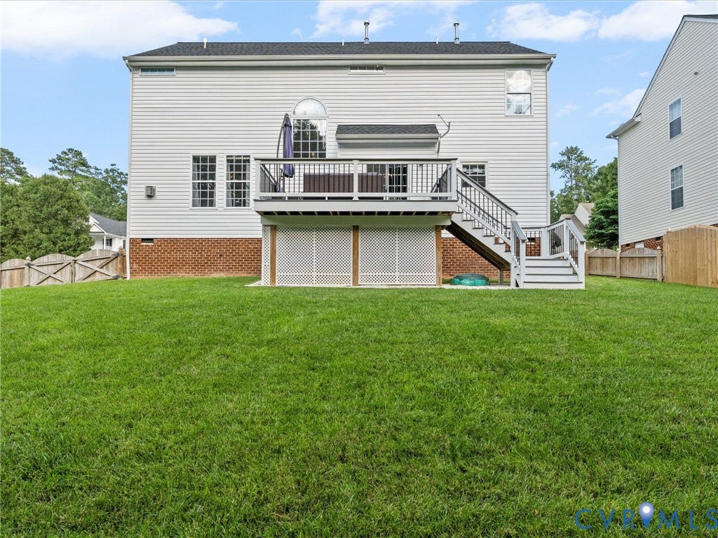2606 Water Race Terrace, Watermill, Midlothian, VA 23112 Expansive lawn with a two-story home featuring white siding and a brick foundation