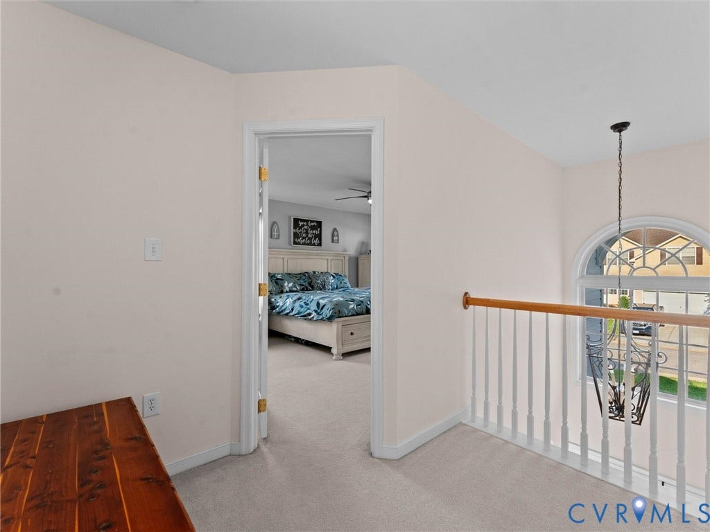 2606 Water Race Terrace, Watermill, Midlothian, VA 23112 Carpeted landing with white balusters and a natural wood handrail