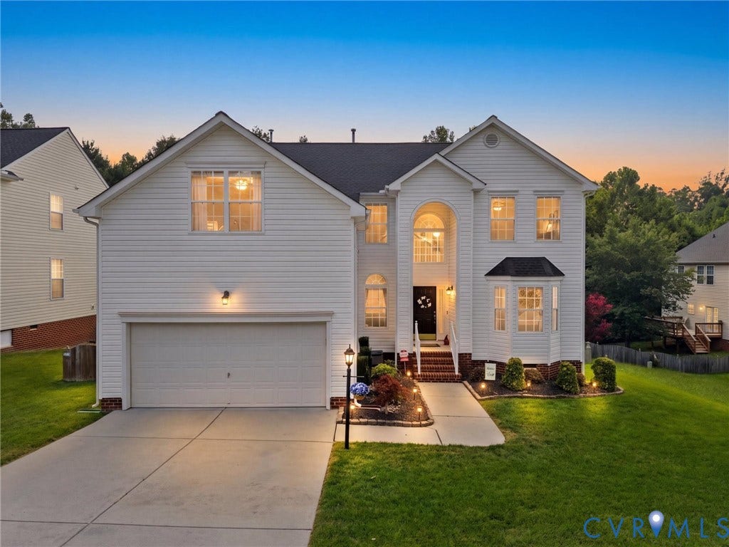2606 Water Race Terrace, Watermill, Midlothian, VA 23112 Two-story residence featuring white siding, a two-car garage, and a concrete driveway