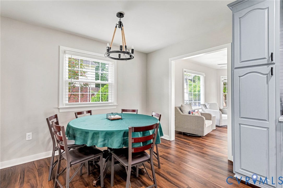 8318 Lydell Drive, Henrico, VA 23228 Wood-finish flooring, recessed lighting, and a contemporary chandelier