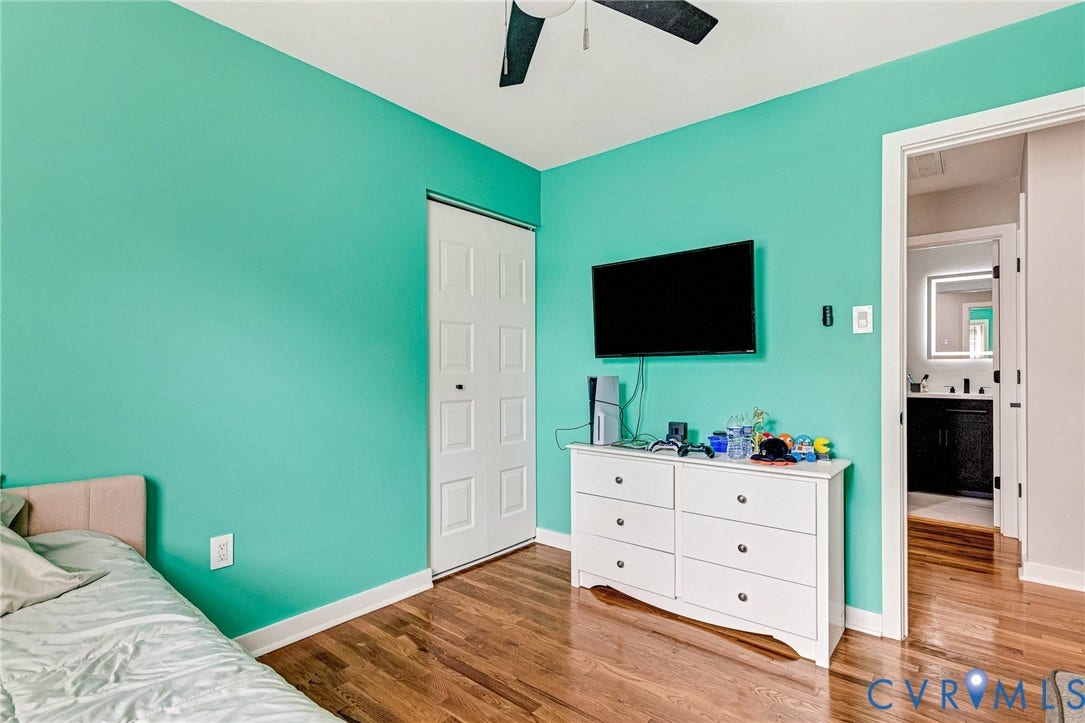 8318 Lydell Drive, Henrico, VA 23228 Hardwood flooring, painted walls, ceiling fan, and a built-in closet