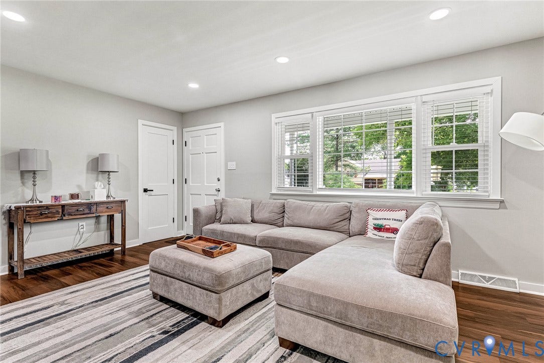 8318 Lydell Drive, Henrico, VA 23228 Recessed lighting, wood-finish flooring, white paneled doors, and a multi-pane window