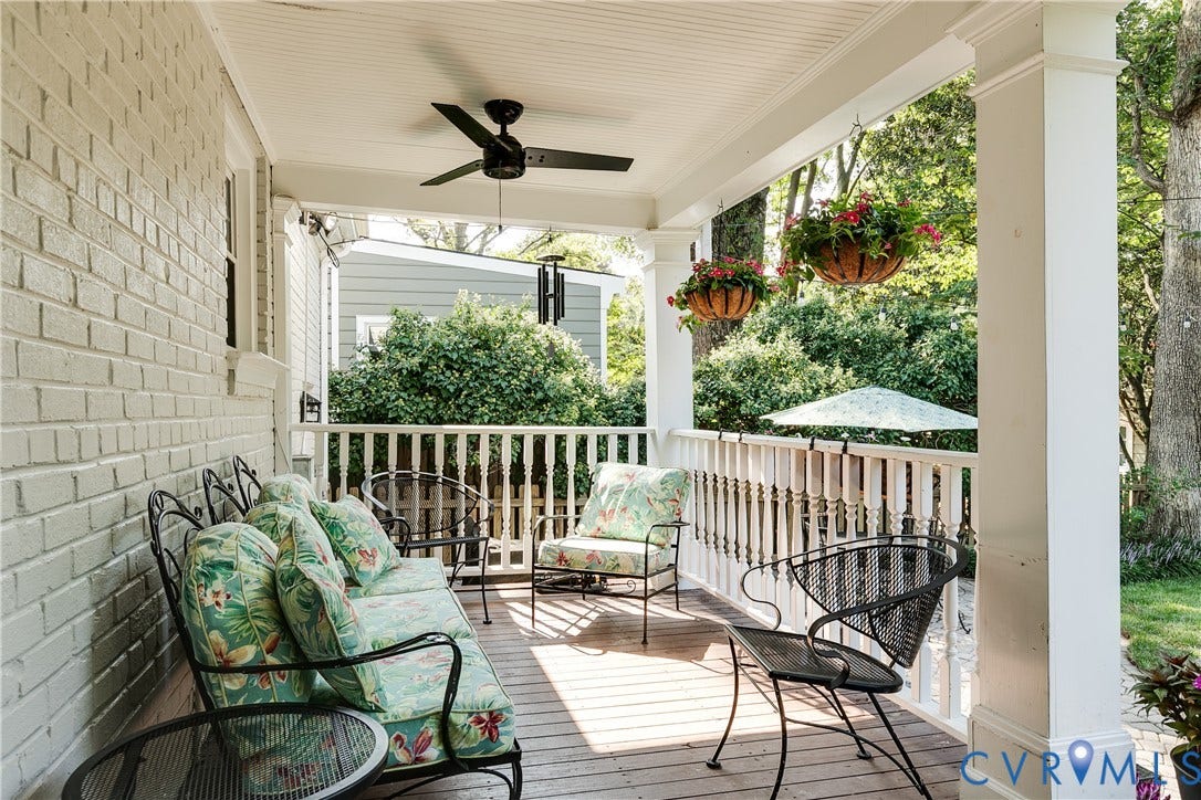 5204 Caledonia Road, Westover Hills, Richmond, VA 23225 Covered porch featuring painted brick siding, wood-finish flooring, and a ceiling fan