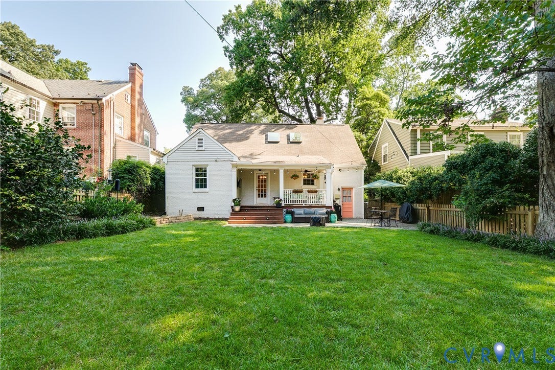 5204 Caledonia Road, Westover Hills, Richmond, VA 23225 Expansive green lawn, covered porch, exterior patio, and wood fencing