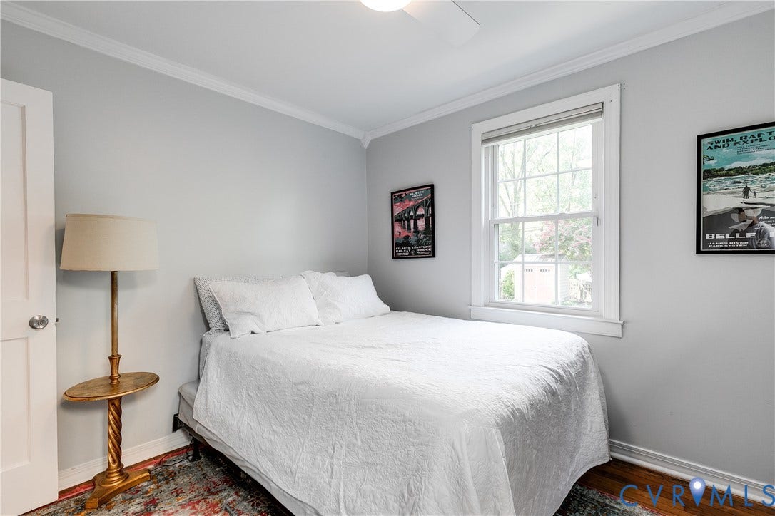 5204 Caledonia Road, Westover Hills, Richmond, VA 23225 Hardwood flooring, crown molding, white trim, and a ceiling fan