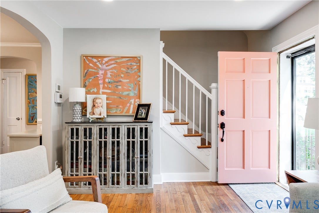 5204 Caledonia Road, Westover Hills, Richmond, VA 23225 Hardwood flooring, paneled entry door, staircase with white risers and wood treads, arched doorway, recessed lighting