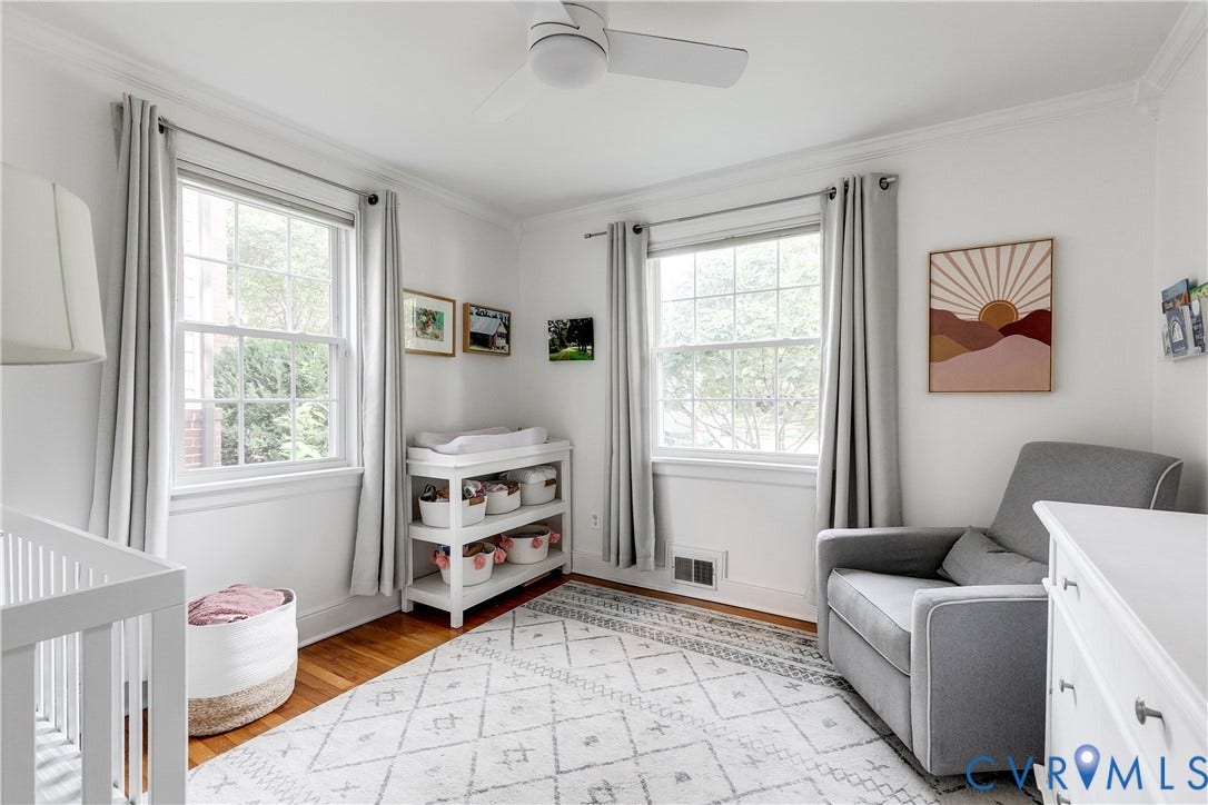 5204 Caledonia Road, Westover Hills, Richmond, VA 23225 Hardwood flooring, crown molding, two large windows, and a ceiling fan