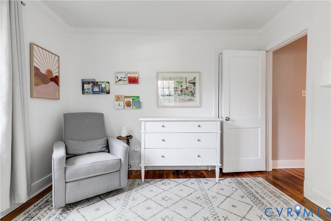 5204 Caledonia Road, Westover Hills, Richmond, VA 23225 Crown molding, wood-finish flooring, white paneled interior door, white built-in dresser with three drawers, and a white baseboard trim