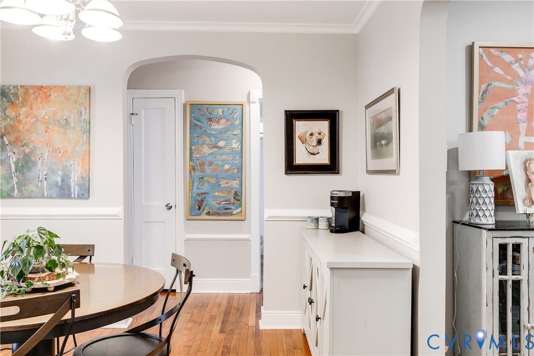 5204 Caledonia Road, Westover Hills, Richmond, VA 23225 Hardwood flooring throughout, arched doorway, crown molding, chair rail molding, and a built-in buffet