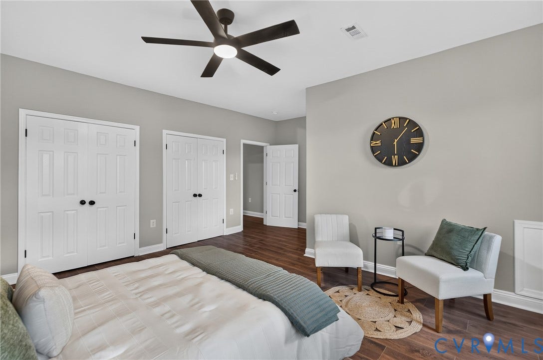 526 N 33rd Street, Church Hill, Richmond, VA 23223 Wood-finish flooring throughout, two sets of white paneled closet doors, and a ceiling fan with integrated lighting