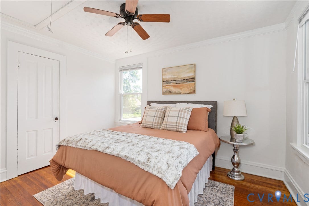 3401 Rosewood Avenue, Carytown, Richmond, VA 23221 Bright room featuring wood-finish flooring, white trim, and a ceiling fan